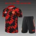 Manchester United 2025/26 Set Allenamento Bambino Rosso Nero
