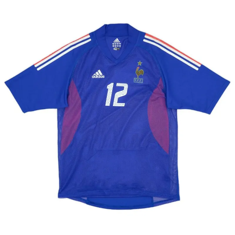 La maglia retro di casa della squadra nazionale francese di Thierry Henry dal 2002 al 2004 - blu.