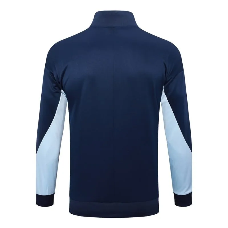 La veste de sport et les pantalons de l'équipe de France 2024/25 - bleu